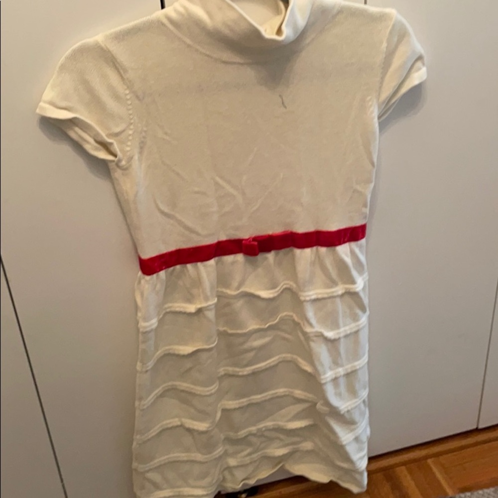 A super cute cream girls dress